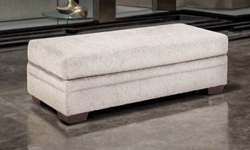 Rectangular fabric upholstered sectional with lift-top storage space.