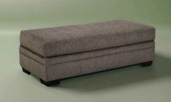 American-made rectangular storage ottoman with Gray fabric upholstery.