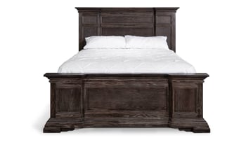 Queen size mansion panel bed in a distressed wood finish.