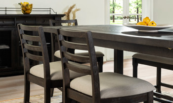 Detailed image of the table and stools.