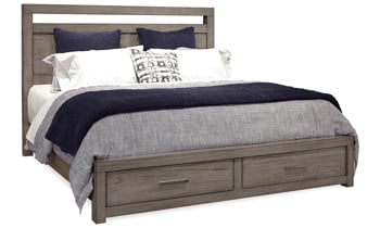 Contemporary panel bed with two storage footboard drawers and USB charging in Graystone finish in bedroom