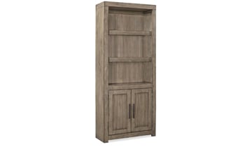 Modern 75-high triple bookcase in Graystone finish used for display in living room