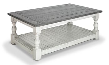 Coffee table in neutral colors of white and gray.