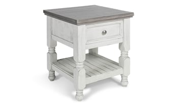 Crafted from solid wood with a weathered Gray and ivory finish.
