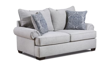 Gray fabric upholstered loveseat with two matching throw pillows.