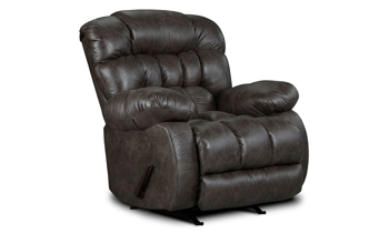 Overstuffed rocker chair in ash Gray upholstery  with manual recliner and triple pillow back.