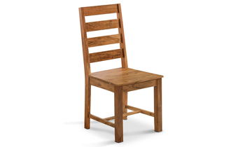 Solid wood dining room chair that was handcrafted by skilled artisans in India.