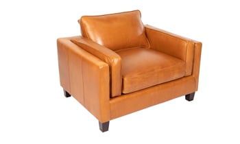 Room scene of Taos Butterscotch top grain leather couch, armchair and matching swivel chair from Rocky Mountain Leather Company.